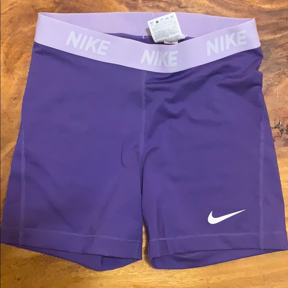 Purple NIKE spandex shorts